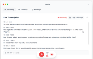 The window is completely white. Tabs at the top: Recording, Summary, Meetings.

At the bottom: the ‘Record’ button with the microphone, the duration of the current recording and, on the web demo, a “stopwatch” button to pause (standard ‘pause’ button on the software).
Section title: Live Transcription.

Status: Recording in progress (indicated by a red dot and the word ‘Recording’).