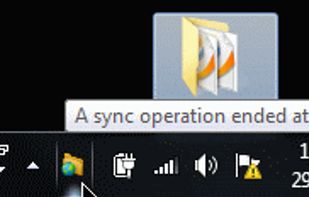 Runs and syncs quietly in the system tray