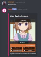 A user purchasing a pack of three virtual trading cards